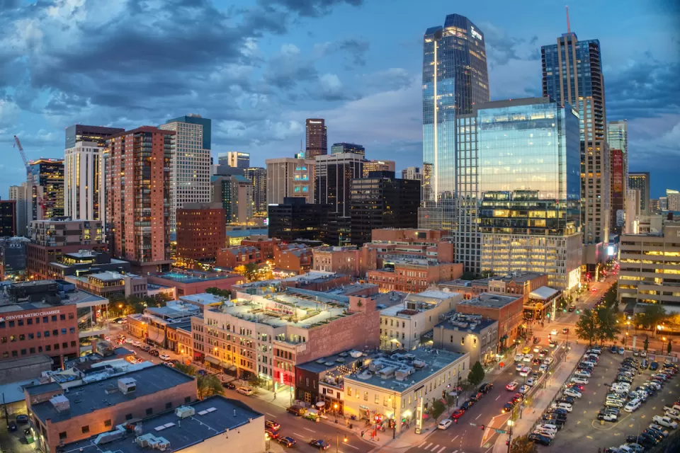 Aerial view of Denver, Colorado skyline at dusk.